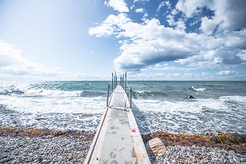 Image showing Small bridge to the cold sea