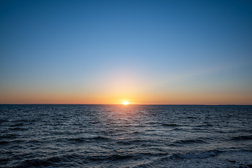 Image showing Sunset over the ocean