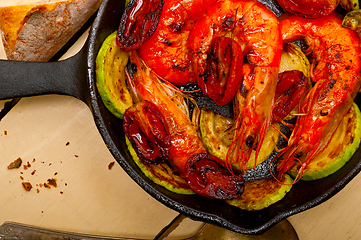 Image showing roasted shrimps with zucchini and tomatoes