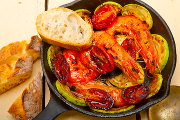 Image showing roasted shrimps with zucchini and tomatoes