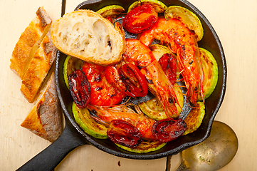 Image showing roasted shrimps with zucchini and tomatoes