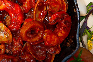 Image showing fresh seafoos stew on an iron skillet