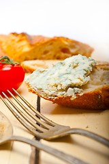 Image showing fresh blue cheese spread ove french baguette