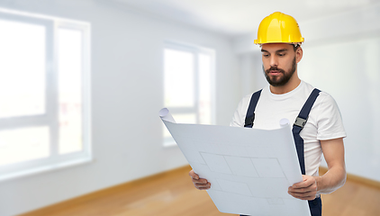 Image showing male worker or builder in helmet with blueprint