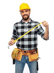 Image showing happy male worker or builder in helmet with ruler
