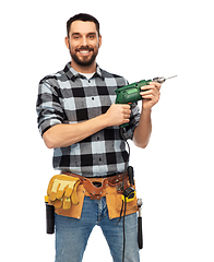 Image showing happy male worker or builder with drill and tools