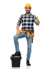 Image showing happy male worker or builder showing thumbs up