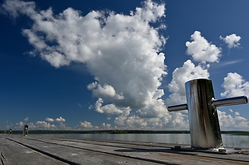 Image showing metal knight on the wooden berth  