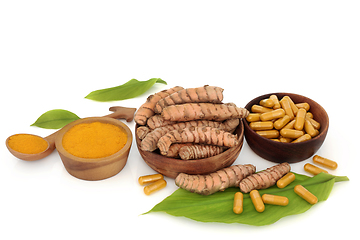 Image showing Healthy Turmeric Root Powder and Supplement Capsules 