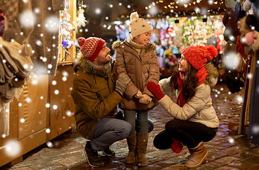 Image showing happy family at christmas market in city