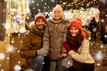 Image showing happy family at christmas market in city