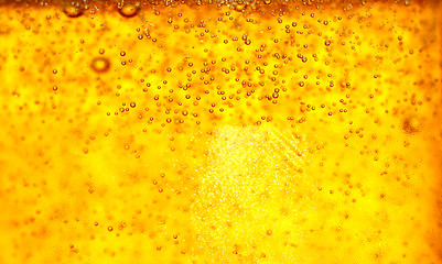 Image showing Glass of beer close-up with bubbles