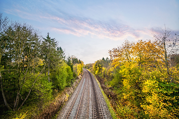 Image showing Colorful autumn scenery with a railroad track