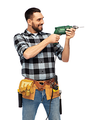 Image showing happy male worker or builder with drill and tools