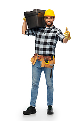 Image showing happy male worker or builder showing thumbs up