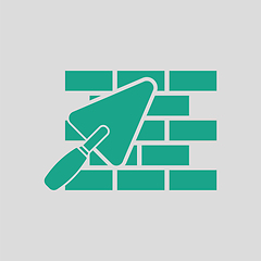 Image showing Icon of brick wall with trowel