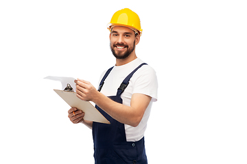 Image showing male worker or builder in helmet with clipboard