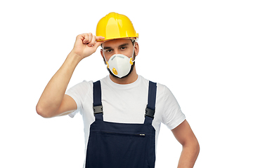 Image showing male worker or builder in helmet and respirator