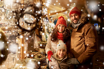 Image showing happy family at christmas market in city