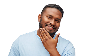 Image showing happy african american man touching his beard