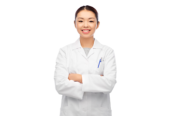 Image showing happy smiling asian female doctor in white coat