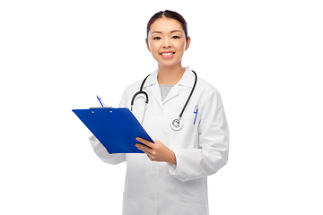 Image showing happy smiling asian female doctor with clipboard