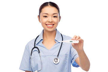 Image showing asian female doctor or nurse with thermometer