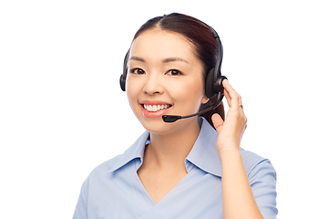 Image showing smiling asian female doctor or nurse in headset