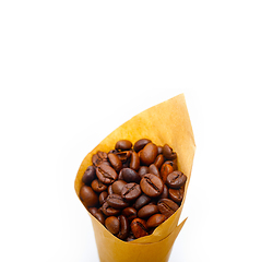 Image showing espresso coffee beans on a paper cone