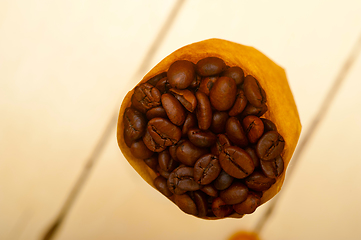 Image showing espresso coffee beans on a paper cone