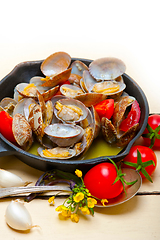 Image showing fresh clams on an iron skillet