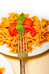 Image showing Italian pasta farfalle butterfly bow-tie and tomato sauce