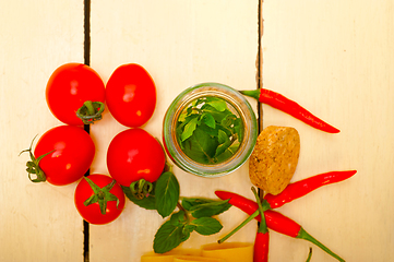 Image showing Italian pasta paccheri with tomato mint and chili pepper