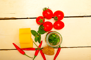 Image showing Italian pasta paccheri with tomato mint and chili pepper