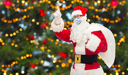 Image showing man in costume of santa claus wearing medical mask