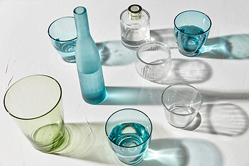 Image showing glassware dropping shadows on white surface