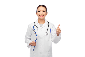 Image showing female doctor with clipboard showing thumbs up