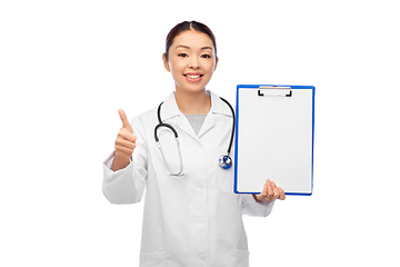 Image showing asian female doctor with clipboard shows thumbs up