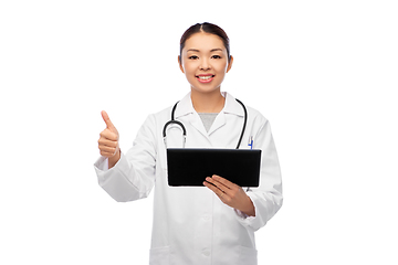 Image showing asian female doctor with tablet pc shows thumbs up