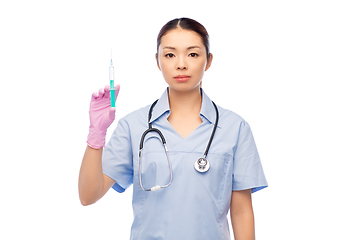 Image showing asian female nurse with medicine and syringe