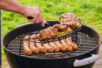 Image showing Barbeque grill party with pork chops