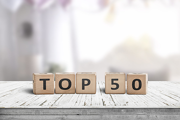 Image showing Top 50 sign made of wooden cubes