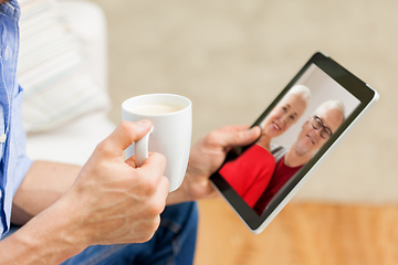 Image showing close up of man having video call on tablet pc