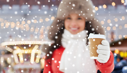 Image showing happy woman drinking coffee at christmas market