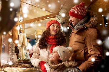 Image showing happy family at christmas market in city