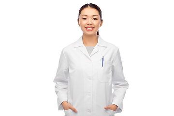 Image showing happy smiling asian female doctor in white coat