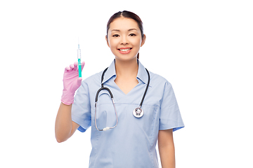 Image showing happy asian female nurse with medicine and syringe