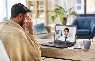 Image showing sick man having video call with doctor at home