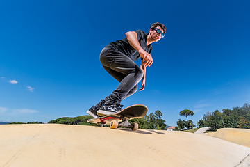 Image showing Skateboarder on a pump track park