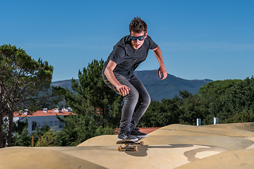 Image showing Skateboarder on a pump track park